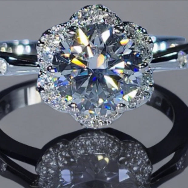 1.06ct Fカラー VVS2 花形ハロー ラウンドリング｜無改色ラボダイヤ・IGI認定・PT950